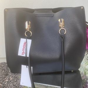 Womens Brand New with Tag (2-in-1) purse. Black, plenty of room. Paid $29.99